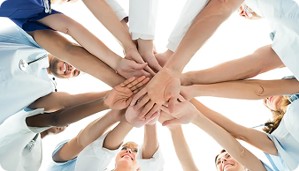 Dental team joining hands